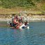 Armada coordina rescate de tres personas desde lancha varada en sector Chabunco